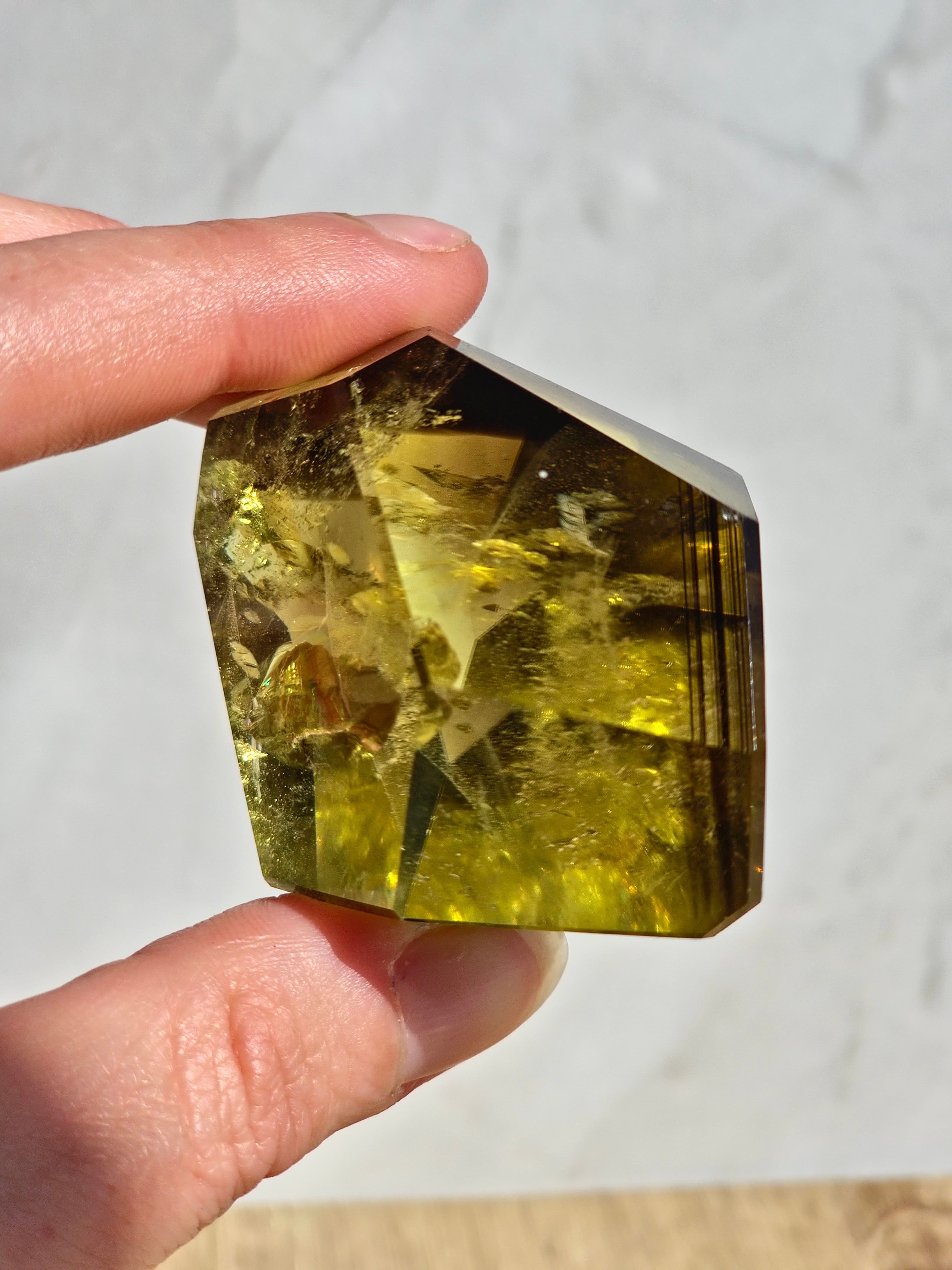 Natural citrine (smoky zoning) with phantom inclusions and rainbow fractures