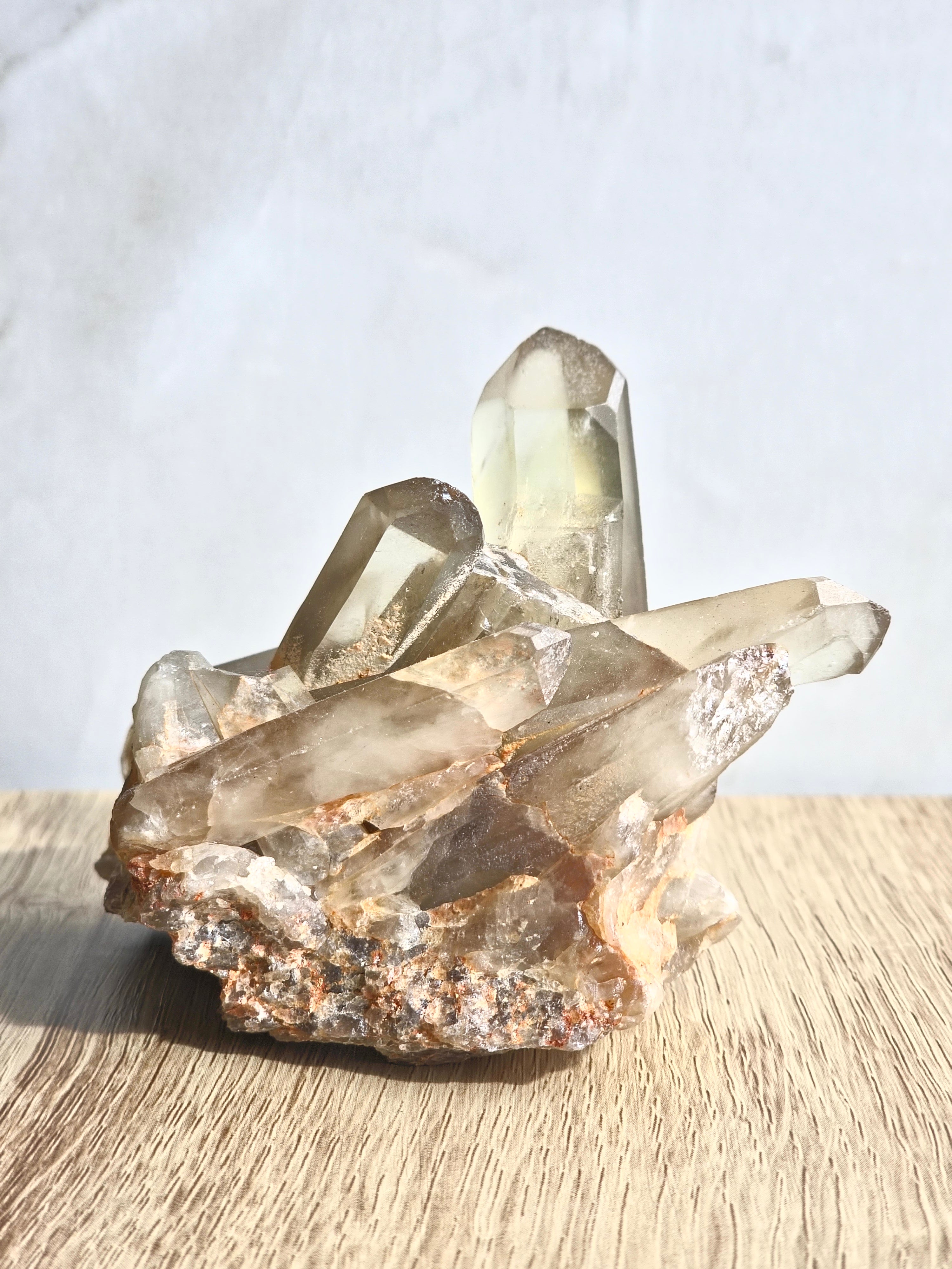 Natural citrine cluster with rainbow inclusion