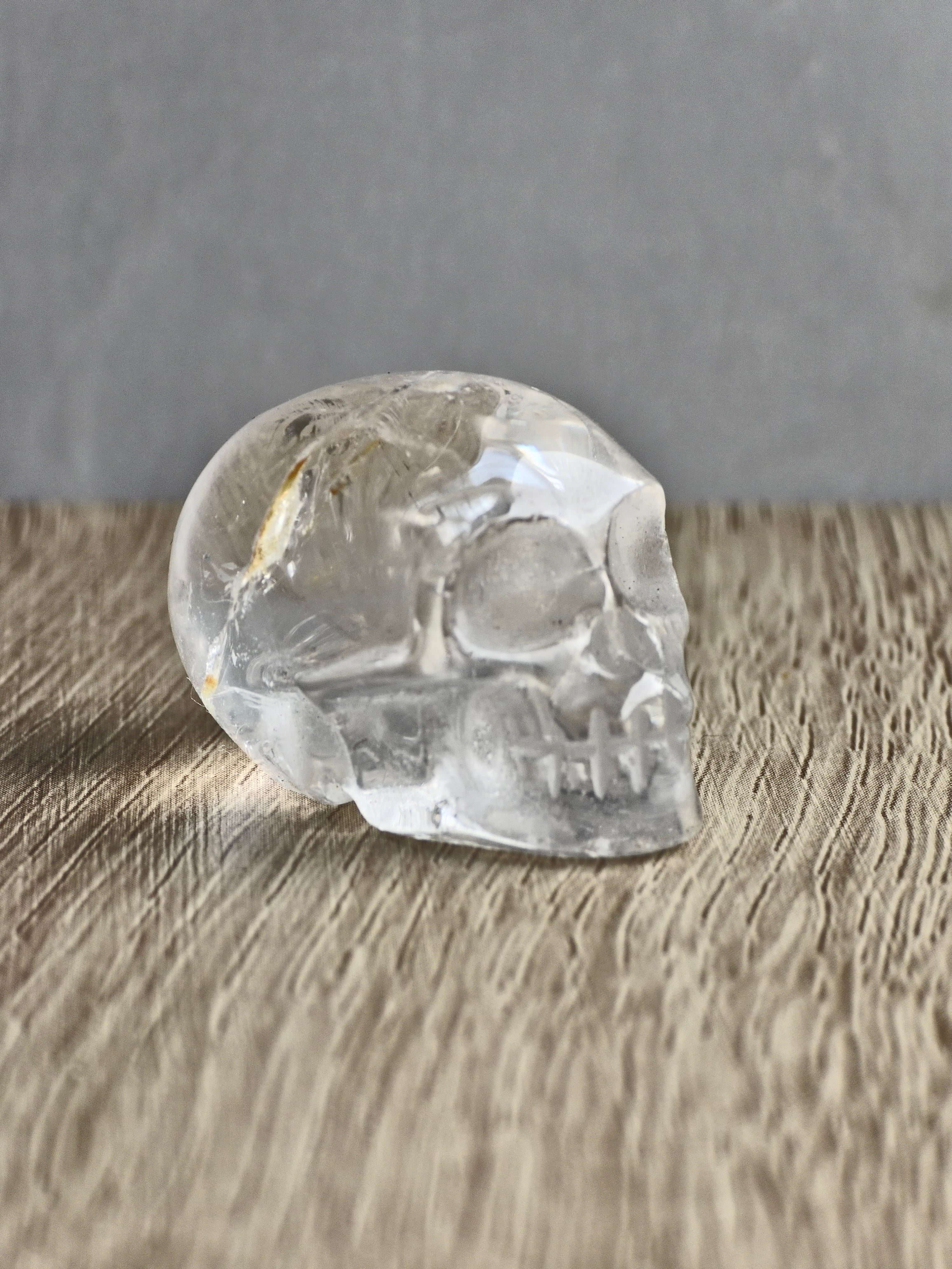 Clear quartz skull with iron inclusions