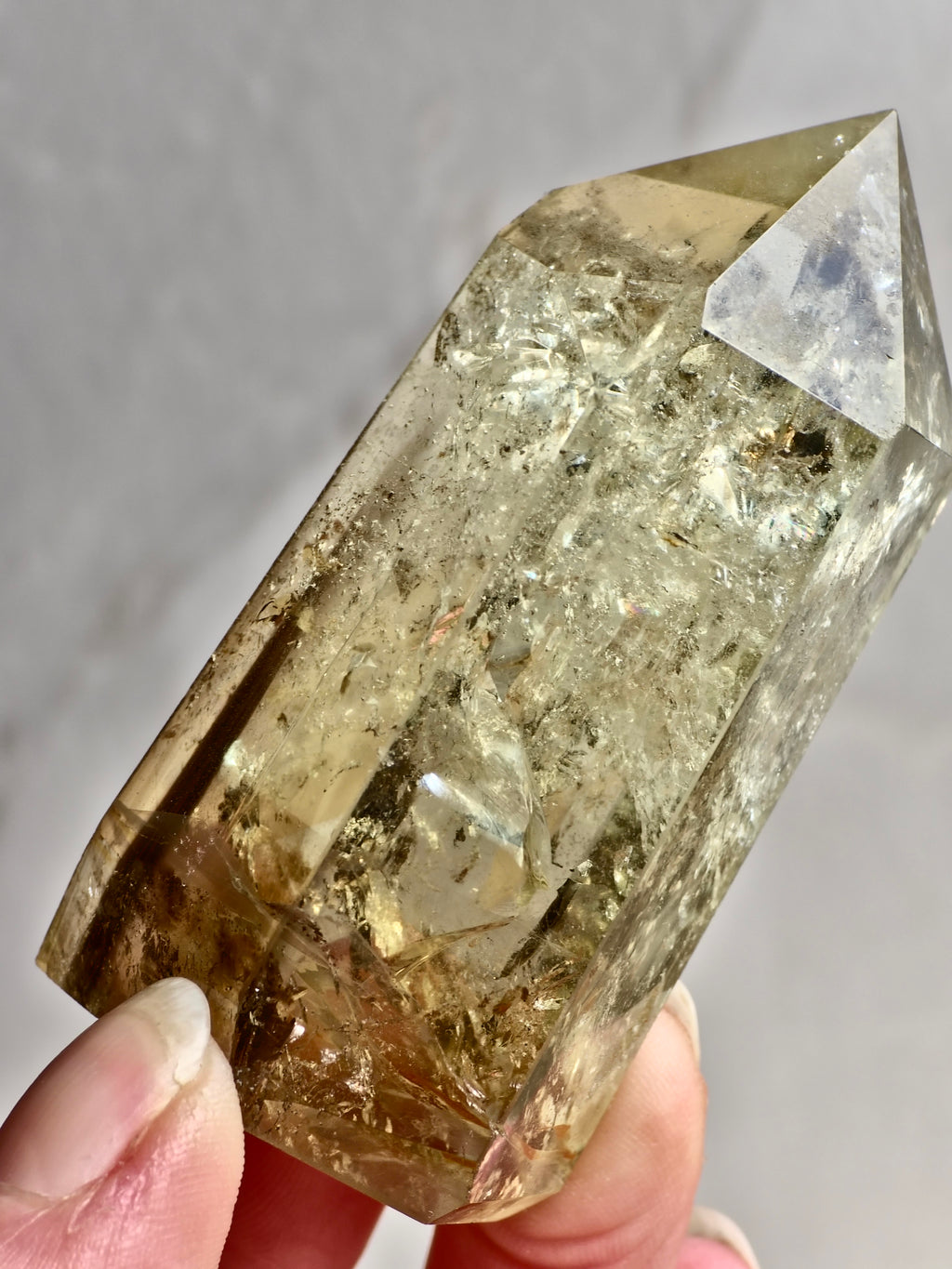 Citrine tower with phantom lines and rainbows