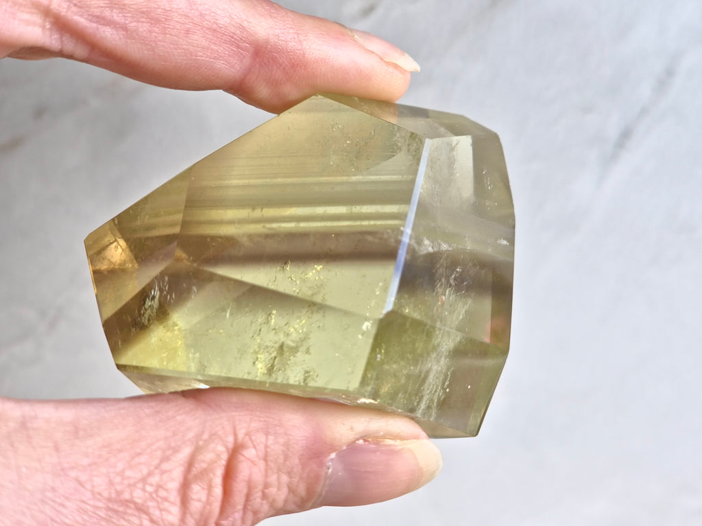 Citrine freeform with white and smoky phantom lines