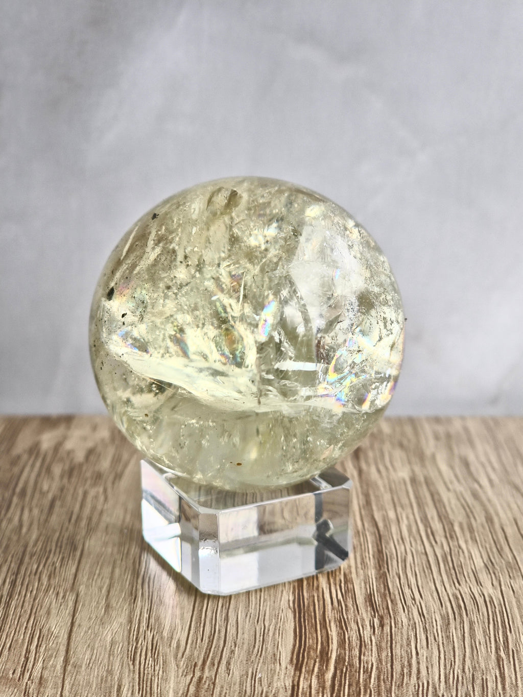 Citrine sphere with tourmaline inclusions